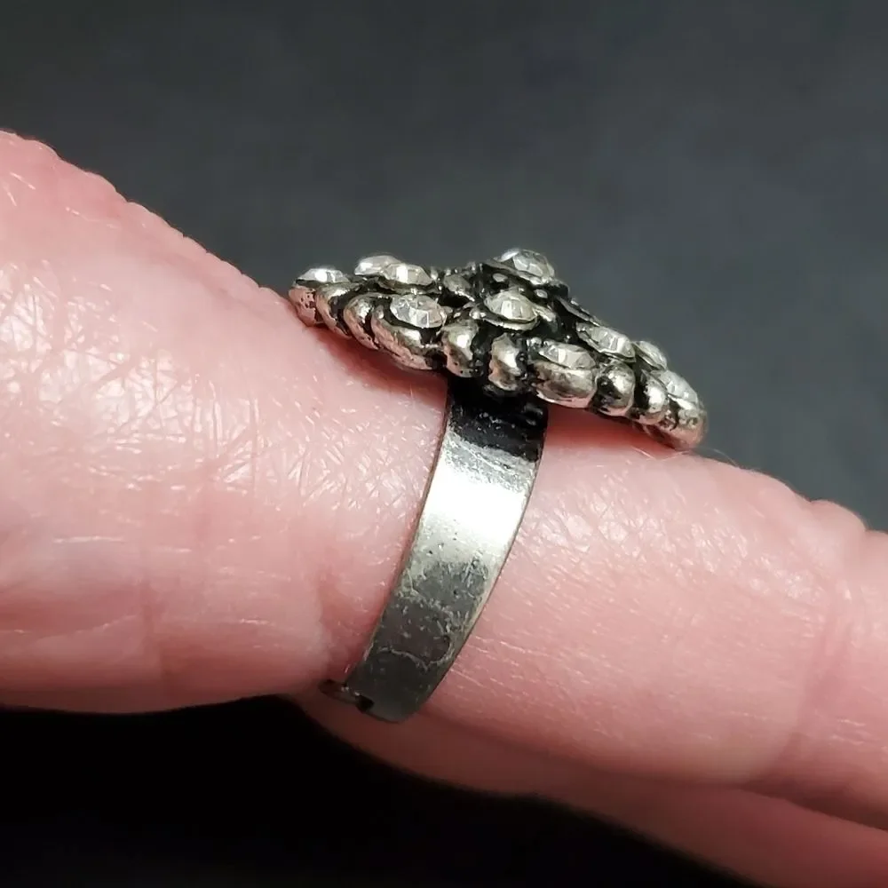 Silver tone flowery rhinestone ring
